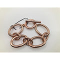 Rose gold chain bracelet on a white background